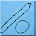J04. Gold beaded bracelet and necklace. 